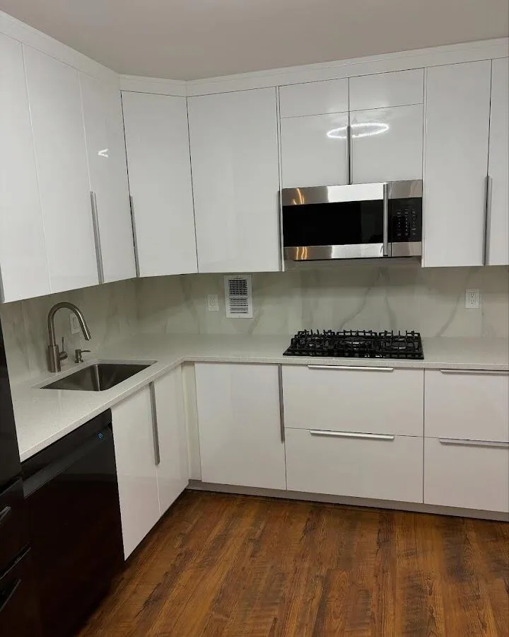 Restored kitchen with white cabinets after water damage in Schiller Park